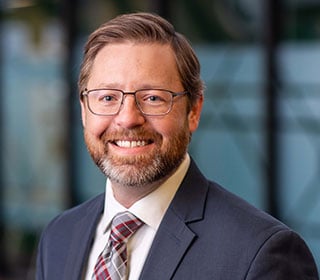 Headshot of Christopher A. Wills